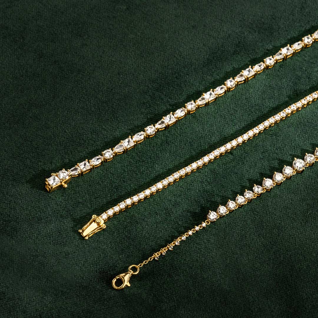 VEYNOU Theia bracelet with 8.50 ct. lab-grown diamonds in 18k yellow gold and various diamond cuts combined with a Tennis bracelet and the Alea bracelet
